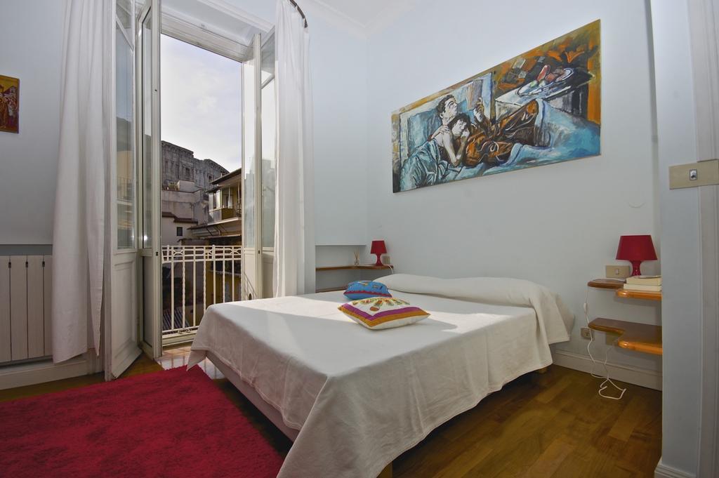 House And The City - Colosseum Apartments Roma Habitación foto